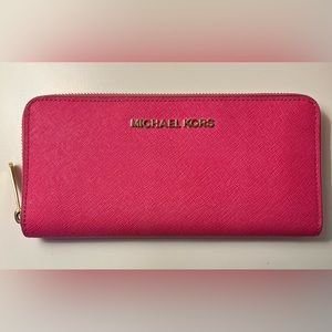 Large zip around Saffiano Leather zip wallet.